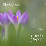 Sketches on Toned Paper: A grey toned paper journal with delicate floral designs throughout creating a gorgeous background for any drawing!