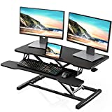 FITUEYES Height Adjustable Standing Desk 36” Wide Sit to Stand Converter Stand Up Desk Tabletop Workstation for Laptops Dual Monitor Riser Black SD309101WB